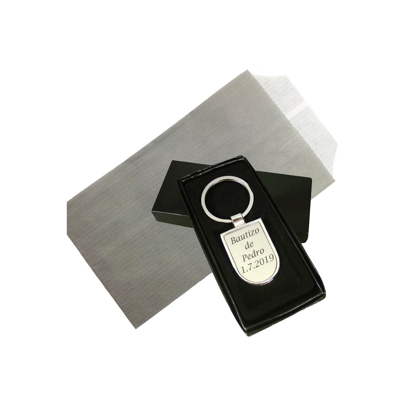 Chaveiro de metal gravado a laser apresentado em envelope kraft cinza personalizado