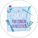 Vela em frasco de vidro com adesivo de agradecimento