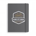 Notebook com bicicleta de borracha