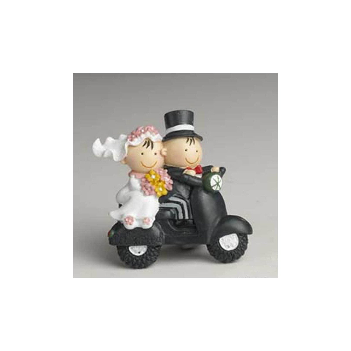 Imã com figura de noivos de casamento