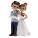 Figura de bolo de casamento noivos com flor vermelha