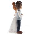 Figura de bolo de casamento noivos com flor vermelha