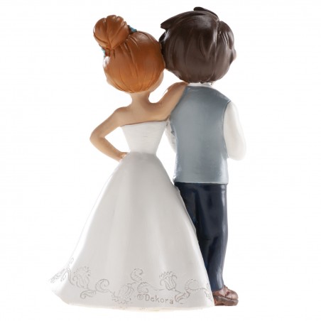 Figura de bolo de casamento noivos com flor vermelha