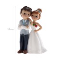 Figura de bolo de casamento noivos com flor vermelha