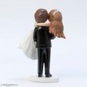 Figura de bolo de casamento noiva nos braços