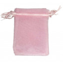 Bolsa unicórnio apresentada em saco de organza rosa personalizado com adesivo