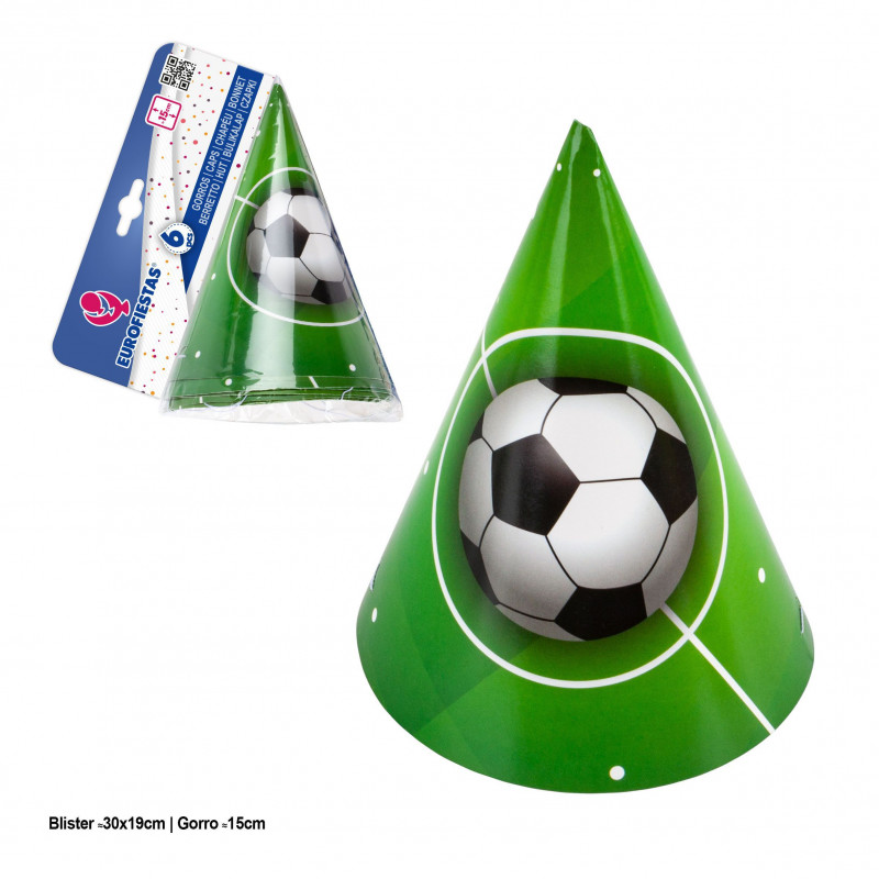 Gorro de festa com bola de futebol sobre grama.