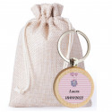 Chaveiro personalizado de batizado de menina presenteado com bolsa