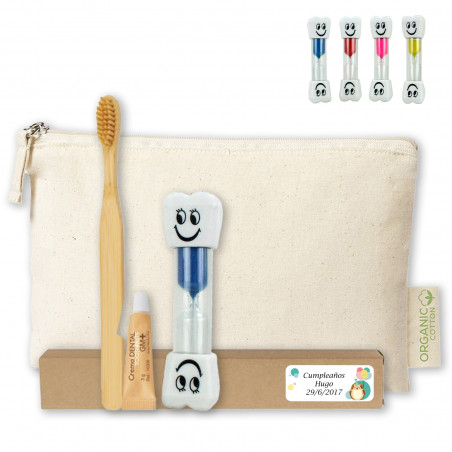 Escova de dentes de bambu com pasta de dente e ampulheta em bolsa de higiene de algodão