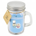 Vela em pote de vidro azul com adesivo personalizado e decoração de casamento