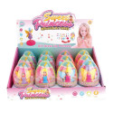 Mini fada boneca com surpresa apresentada em ovo de plástico