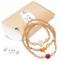Pulseira de pingente de marinheiro em envelope kraft com adesivo inicial para detalhes
