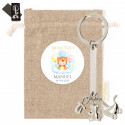 Chaveiro com chanfros de metal com bolsa de pano e adesivo personalizável para detalhes
