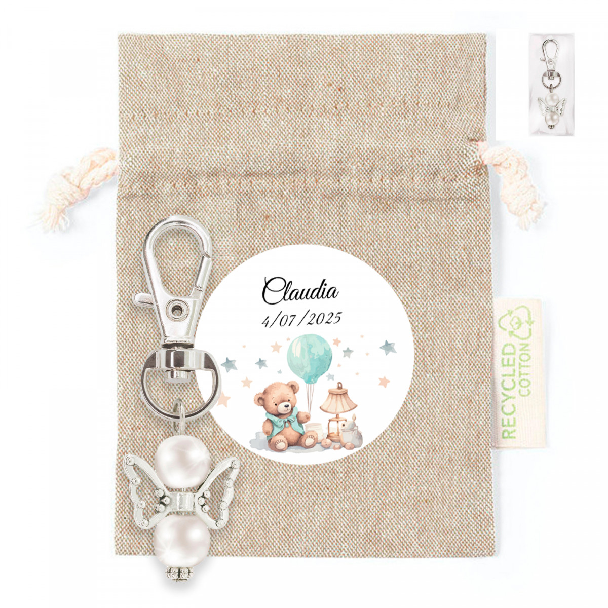 Chaveiro anjo da guarda em saquinho de pano com adesivo personalizado para detalhes do batismo