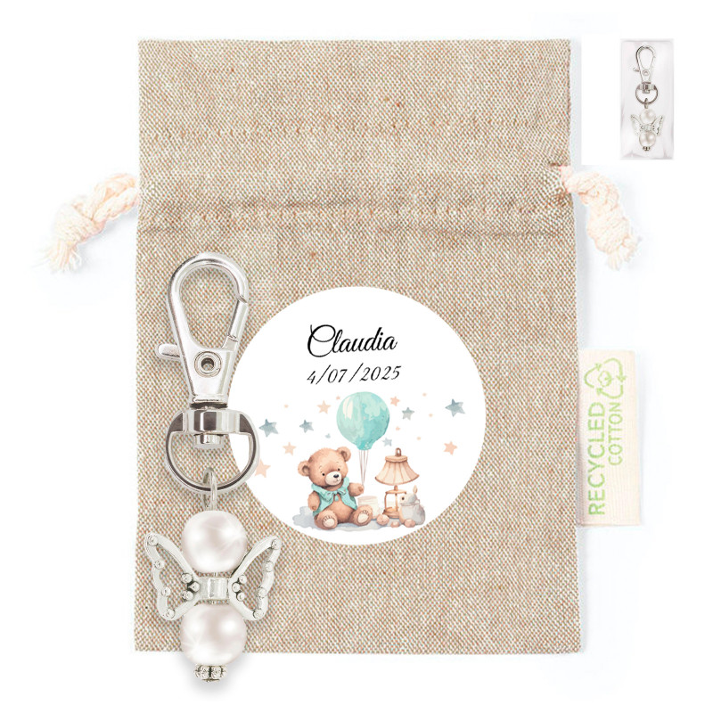 Chaveiro anjo da guarda em saquinho de pano com adesivo personalizado para detalhes do batismo