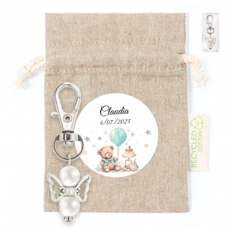 Chaveiro anjo da guarda em saquinho de pano com adesivo personalizado para detalhes do batismo