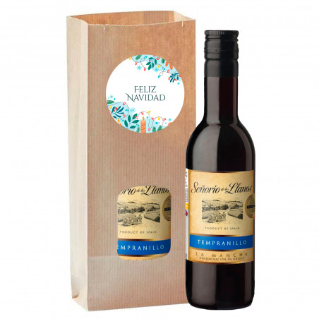 Vinho tinto em bolsa kraft personalizada com adesivo natalino para detalhes