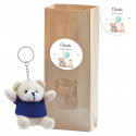 Chaveiro de ursinho de pelúcia em saco de papel com janela e adesivo personalizado para batizados