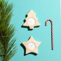 Velas com figuras natalinas estrela e árvore de Natal