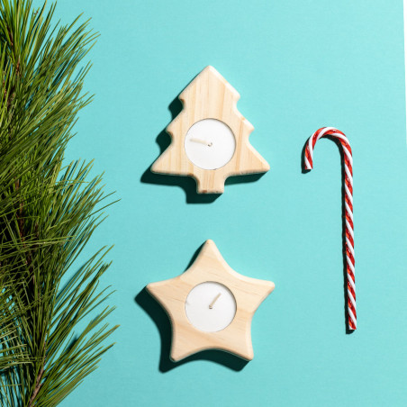 Velas com figuras natalinas estrela e árvore de Natal