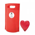 Aquece-mãos em forma de coração vermelho com bolsa e adesivo personalizado