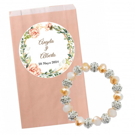 Pulseira brilhante em envelope de papel rosa pastel com adesivo floral personalizável