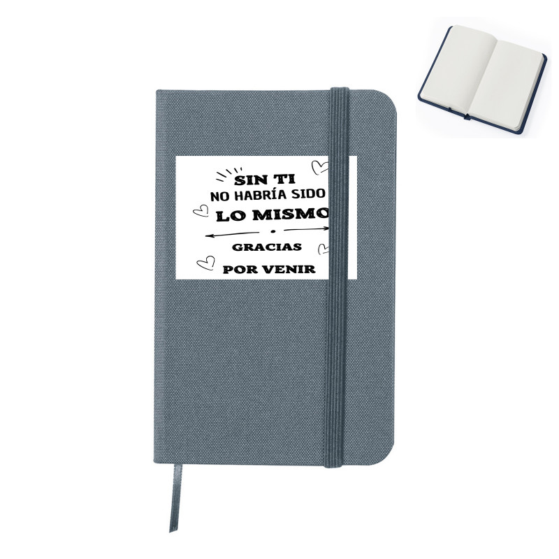 Caderno cinza com adesivo de agradecimento para convidados