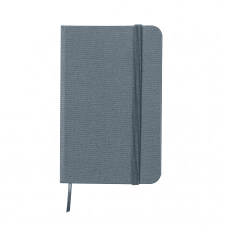 Caderno cinza com adesivo de agradecimento para convidados