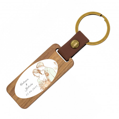 Chaveiro de madeira com adesivo oval para detalhes dos convidados do casamento