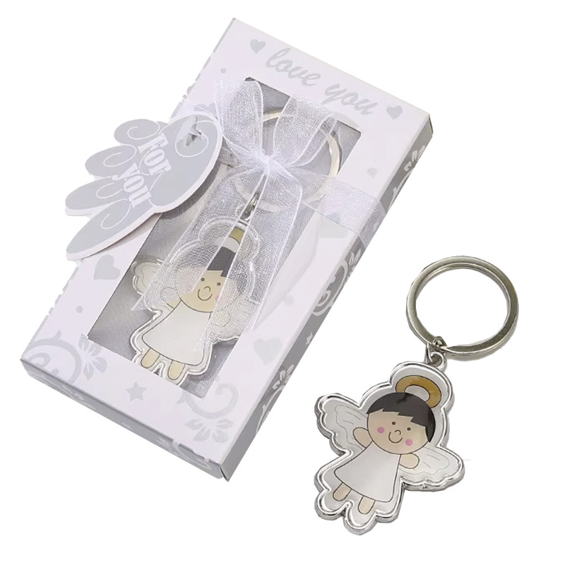 Chaveiro de anjo sorridente com asas apresentado em caixa de presente