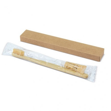Escova de dentes de bambu com pasta de dentes e ampulheta em necessaire de algodão