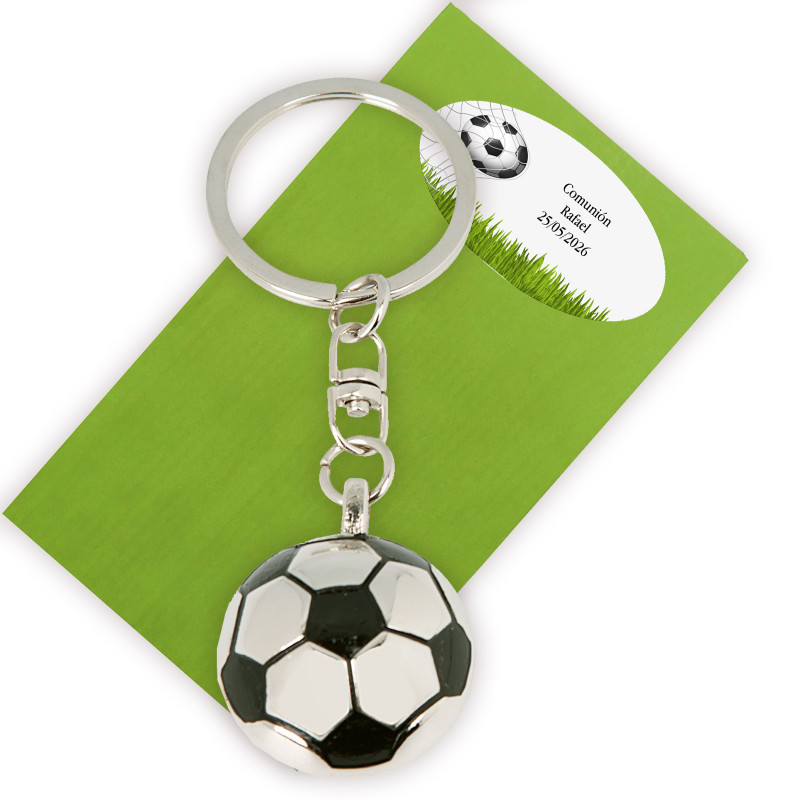 Chaveiro em forma de bola de futebol apresentado em envelope verde e adesivo com texto