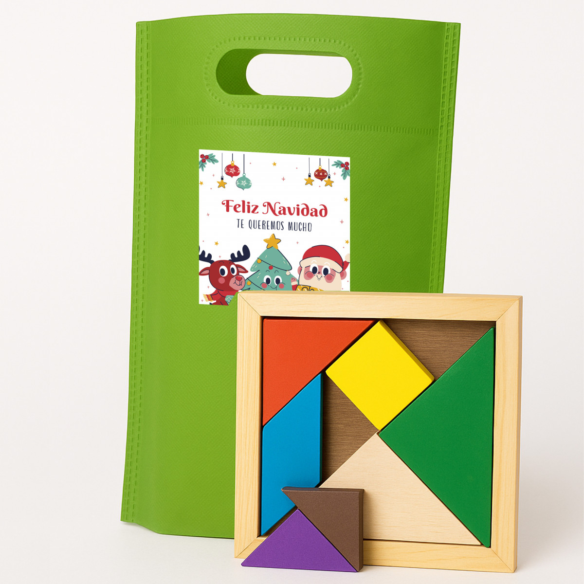 Tangram de madeira com bolsa verde para o Natal