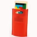 Tetris de madeira com peças coloridas em bolsa vermelha 13x17 e adesivo de papai noel e amigos para presentear no natal
