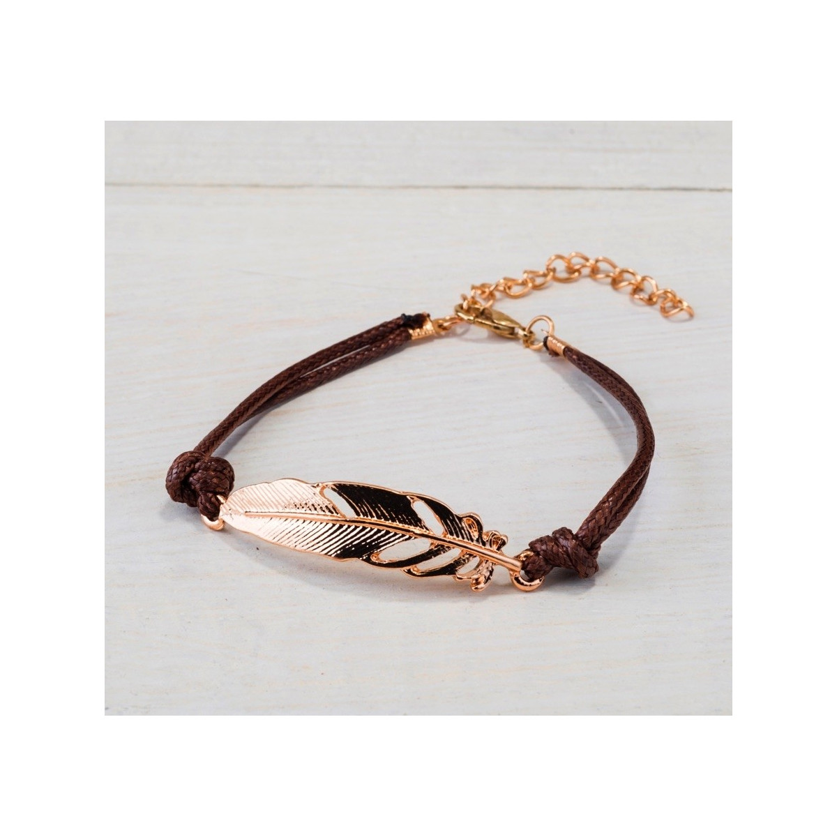 Pulseira de penas douradas